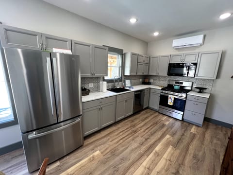 Nice new appliances adorn the kitchen