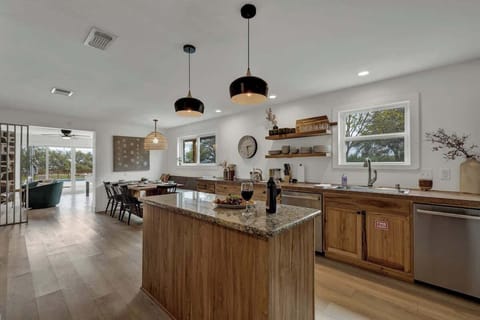 Full kitchen with dining area.