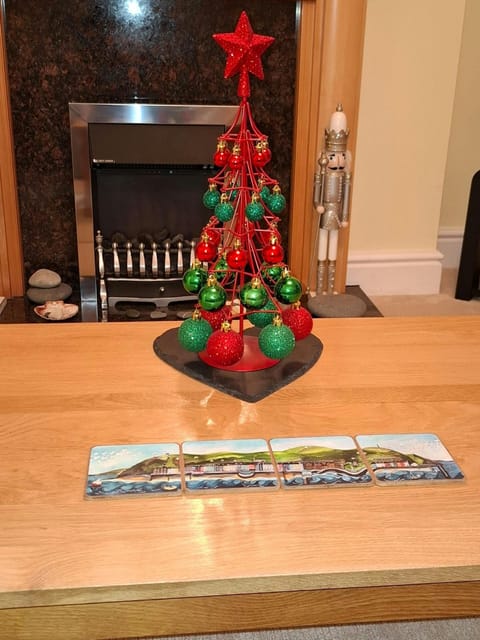 Living room with coffee table and miniature Christmas tree