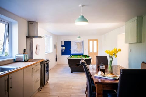 Kitchen and dining area, games area with pool table