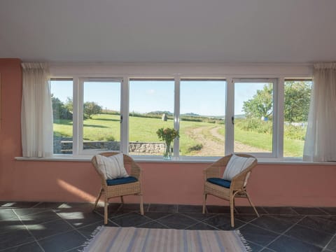 Entrance hall with windows overlooking garden