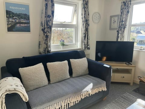 Log burner, sofas, coffee table, TV