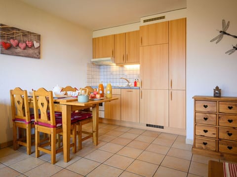 Cabinetry, Furniture, Property, Table, Wood, Lighting, Interior Design, Dresser, Drawer, Floor