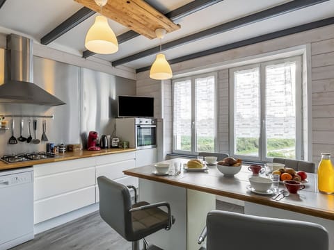 Furniture, Property, Cabinetry, Countertop, Building, Kitchen, Chair, Window, Lighting, Interior Design