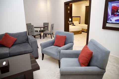 Exclusive Apartment | Living area | 42-inch plasma TV with satellite channels, printers