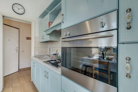 Family Apartment, 2 Bedrooms (Il Giardino Di Dante Stresa Center) | Private kitchen | Fridge, oven, stovetop, coffee/tea maker