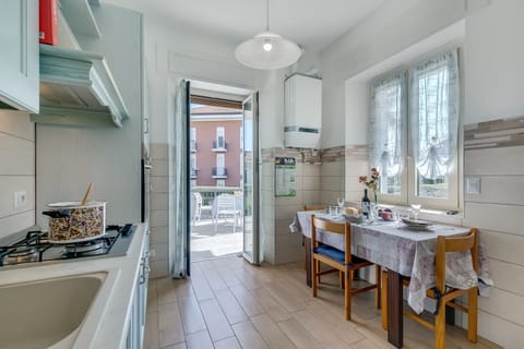 Family Apartment, 2 Bedrooms (Il Giardino Di Dante Stresa Center) | Private kitchen | Fridge, oven, stovetop, coffee/tea maker