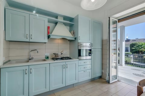 Family Apartment, 2 Bedrooms (Il Giardino Di Dante Stresa Center) | Private kitchen | Fridge, oven, stovetop, coffee/tea maker
