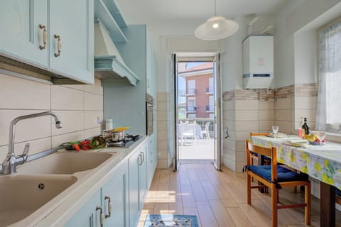 Family Apartment, 2 Bedrooms (Il Giardino Di Dante Stresa Center) | Private kitchen | Fridge, oven, stovetop, electric kettle