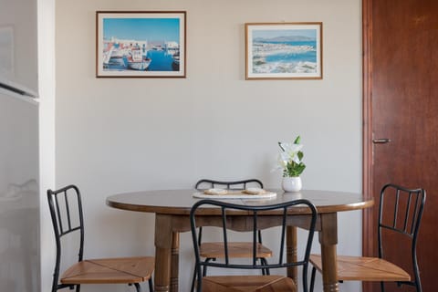 Superior Quadruple Room | Living area | 25-inch flat-screen TV with cable channels