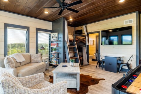 Create unforgettable family memories in our game room with tucked-away bunks and gorgeous views.