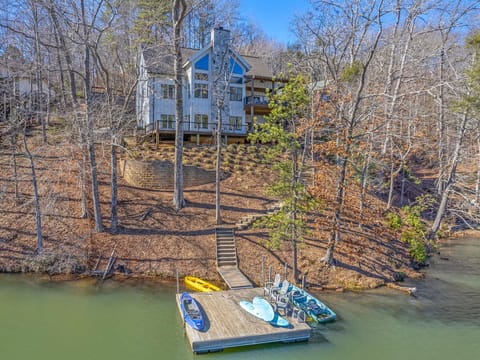 Welcome to the Family Lake House. Nestled in the foothills of the Blue Ridge Mountains, the home is Rumbling Bald On Lake Lure community, on Bald Mountain Lake at the north end of Lake Lure.
