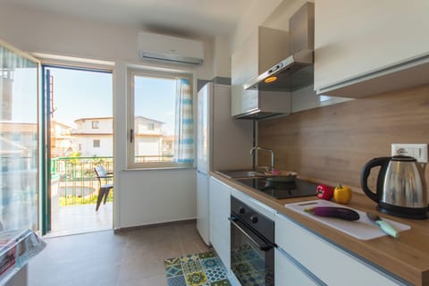 Family Apartment, 1 Bedroom (Little Paradise Beach) | Private kitchen | Fridge, oven, stovetop, electric kettle