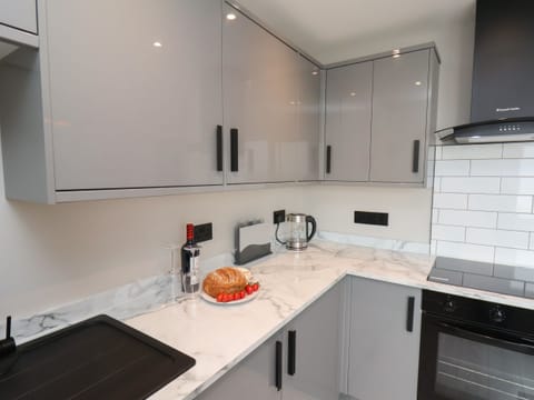 Fridge, electric kettle, toaster, cookware/dishes/utensils