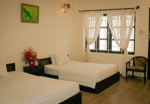 Standard Quadruple Room | Premium bedding, minibar, desk, free WiFi