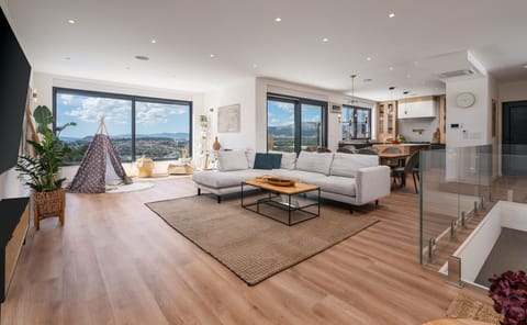 Living area with reading corner and a children corner with some toys and fun zone