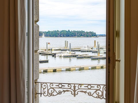 Sky, Plant, Cloud, Street Light, Urban Design, Road Surface, Tree, Building, Landscape, Road