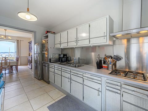 Sky, Plant, Cloud, Street Light, Urban Design, Road Surface, Tree, Building, Landscape, Road