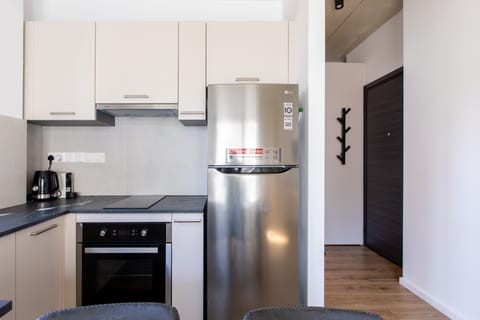 Deluxe Studio | Private kitchen | Full-size fridge, oven, stovetop, espresso maker