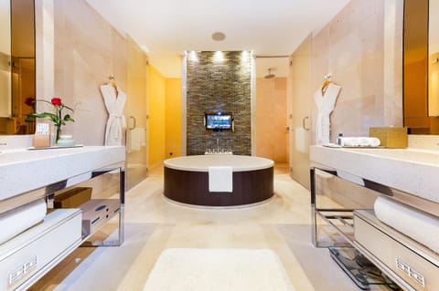 Premier King | Bathroom | Separate tub and shower, rainfall showerhead, designer toiletries