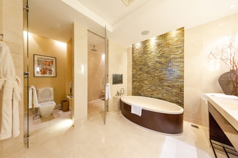 Premier Suite | Bathroom | Separate tub and shower, rainfall showerhead, designer toiletries