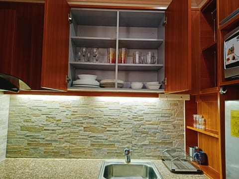 Apartment, 2 Bedrooms | Private kitchen | Fridge, microwave, stovetop, dishwasher