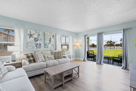 Living Area - Patio access - smart tv - sleeper sofa - linens provided