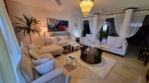 Superior Apartment, 5 Bedrooms, Ocean View | Living area | 42-inch flat-screen TV with digital channels