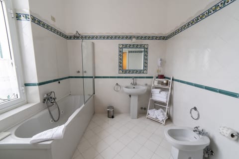 Double Room, Sea View | Bathroom | Hair dryer, bathrobes, bidet, towels