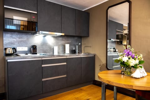 Junior Apartment | Private kitchen | Mini-fridge, dishwasher, cookware/dishes/utensils