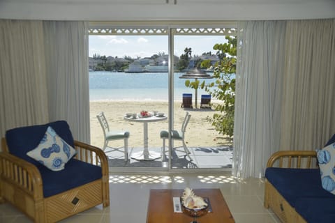 Suite, 1 King Bed with Sofa bed, Kitchen, Lagoon View | In-room safe, individually decorated, laptop workspace, blackout drapes