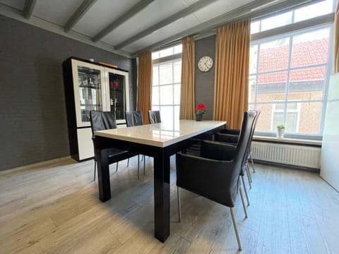 Our dining area is a welcoming space, perfect for family dinners or a relaxing breakfast to start your day