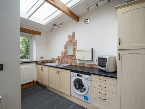 Washing machine, sink, and draws and cupboards