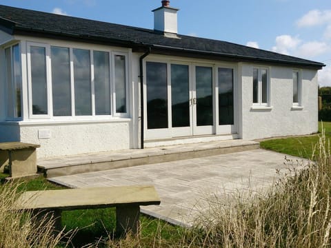 Rockfield from the garden, showing the patio area