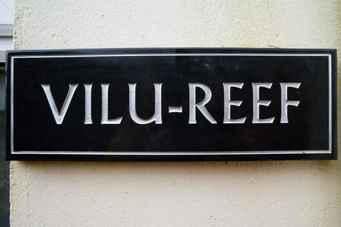 Slate wall mounted apartment sign