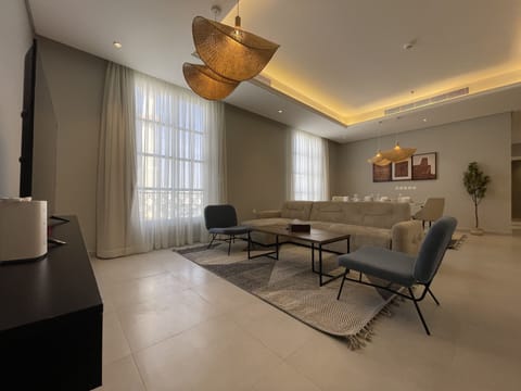 Design Apartment, 3 Bedrooms | Living area | Flat-screen TV