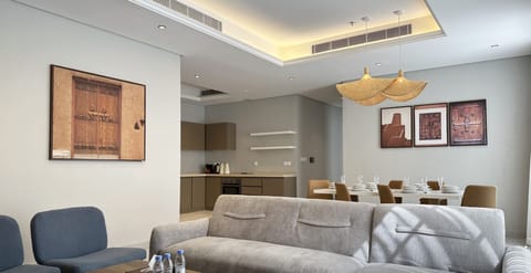 Design Apartment, 3 Bedrooms | Living area | Flat-screen TV