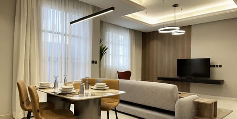 Design Apartment, 3 Bedrooms | Living area | Flat-screen TV