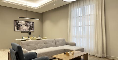 Design Apartment, 3 Bedrooms | Living area | Flat-screen TV