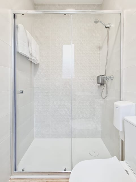 Double Room | Bathroom | Shower, hair dryer, towels, soap