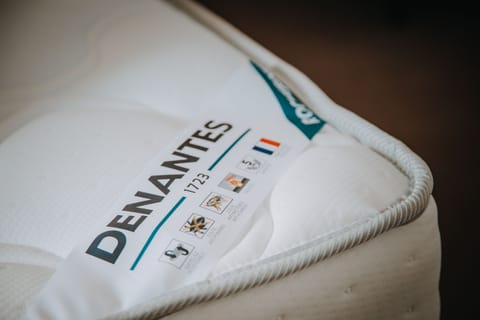 Desk, laptop workspace, blackout drapes, iron/ironing board