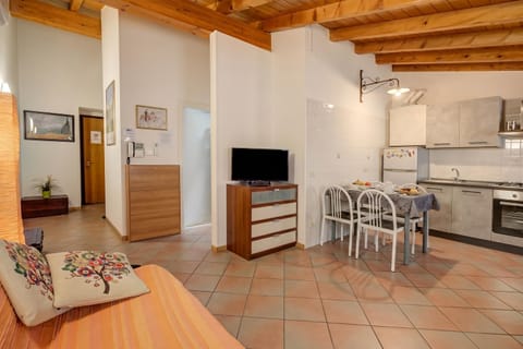 Family Apartment, Multiple Bedrooms (Casa Arx) | Living area | 21-inch Smart TV with cable channels