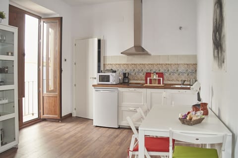 Standard Apartment, 2 Bedrooms | Private kitchen | Mini-fridge, microwave, stovetop, coffee/tea maker