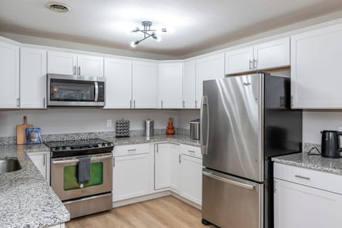 The large refrigerator and dishwasher make meal prep and clean-up a breeze.