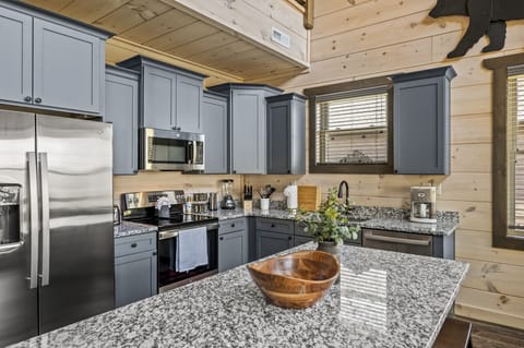 Cabin By The Creek's fully equipped kitchen