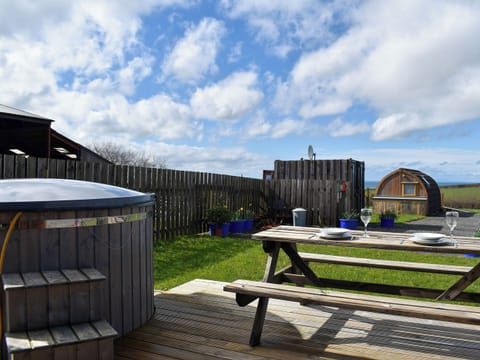 Decked terrace with outdoor furniture | Black Coombe - Moorside Glamping Pods, Corney, near Millom