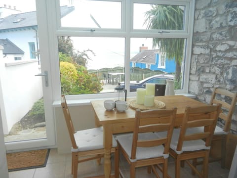 Dining area with table and four chairs