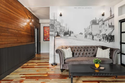 Suite, 1 Queen Bed | Living area | Fireplace