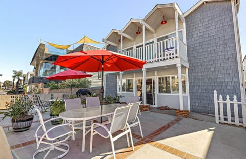 Enjoy an oversized front oceanview patio with two BBQ grill's and outdoor dining with umbrellas
                