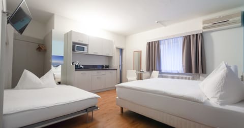 Studio, Kitchenette | In-room safe, free WiFi, bed sheets